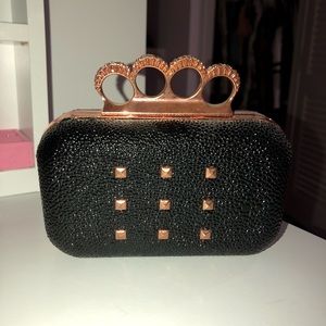 Rihanna Rogue Black and Rose Gold Clutch